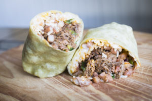 Whole Foods- A spinach wrap with shredded beef, white rice, shredded cheese, beans, mild salsa and diced jalepenos. Price: $7.99